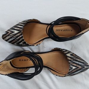 Black, white, and brown woven flats